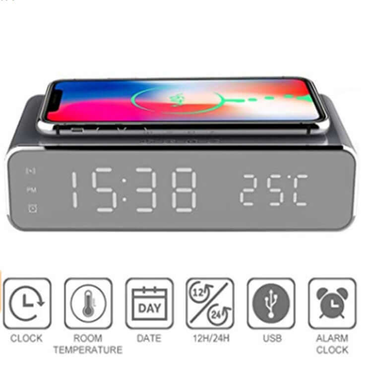 Wireless charging alarm clock with temperature display, showing time and smartphone charging on top.