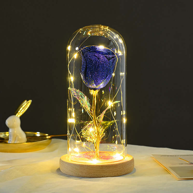 Eternal rose in glass dome with LED lights, romantic decoration for gifts, weddings, and special occasions.