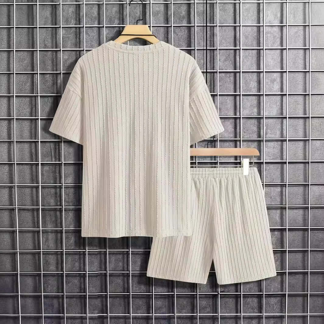 Men's solid color casual short sleeve knitting suit in milky white, featuring matching shorts and lightweight fabric.