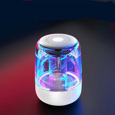 Colorful LED portable Bluetooth speaker with powerful bass and wireless capabilities, perfect for outdoor use.