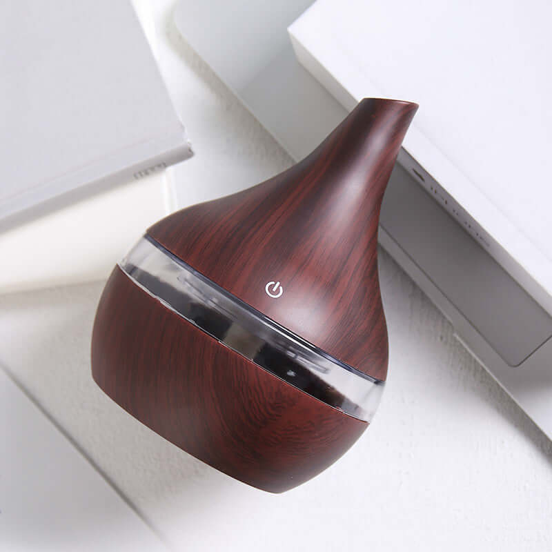 Round wood grain humidifier air purifier for home use, featuring USB power and low noise operation.