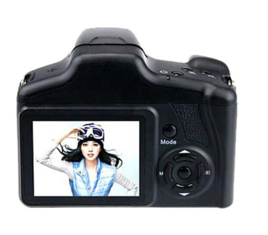 Back view of a digital camera showing a 2.5-inch LCD screen with a woman wearing a hat and goggles.