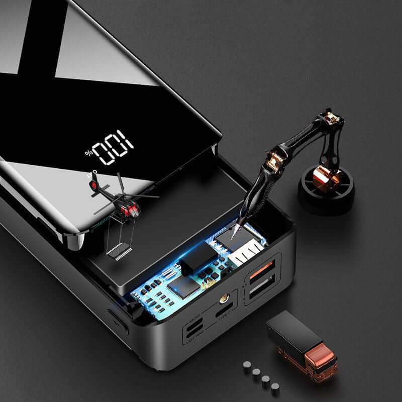 Detailed view of a 30000mAh power bank showcasing LCD display and internal components on a sleek black background.