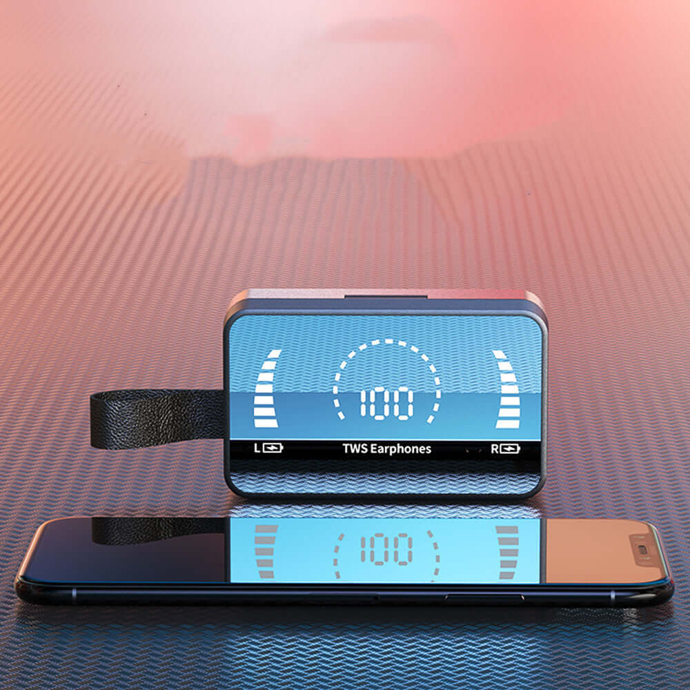 Bluetooth 5.0 earphone charging case showing battery level next to smartphone on textured surface.