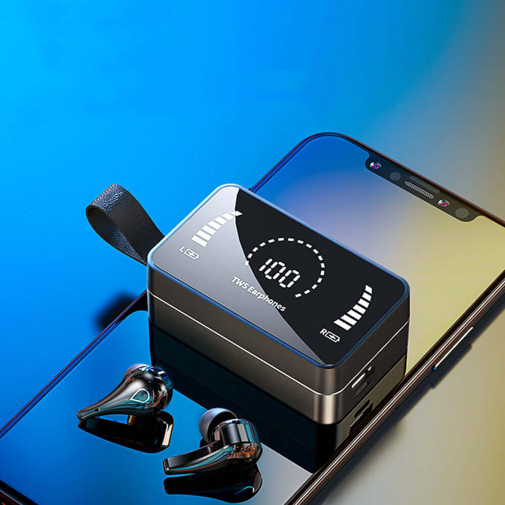 Bluetooth 5.0 earphones charging case with LED display next to earbuds on a smartphone background.