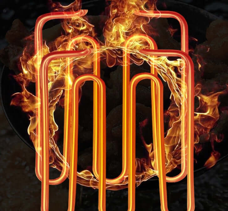 Heating element for electric fryer surrounded by flames, showcasing powerful heating capability.