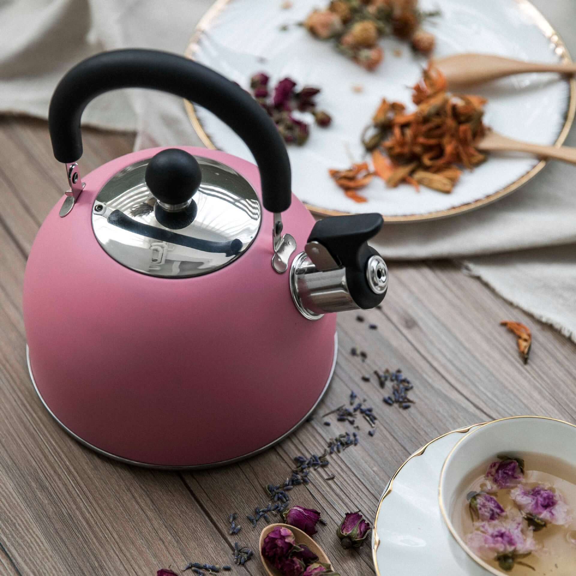 Ru Yi pink stainless steel kettle with anti-scald handle, perfect for 1-3 people, stylish and functional.