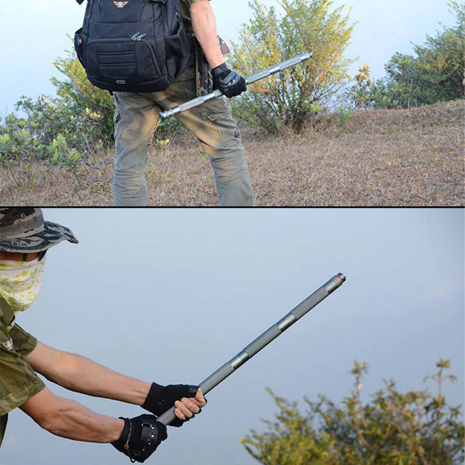 Person using a tactical stick outdoors, showcasing its durability and multifunctional design for hiking and camping.