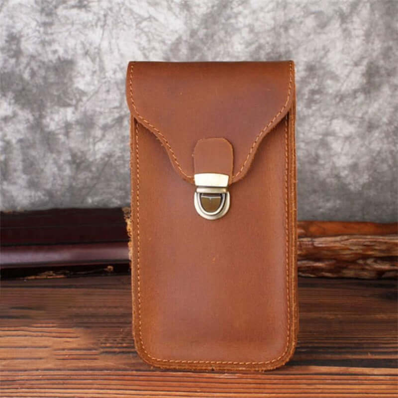 Brown leather retro mobile phone bag, portable protective cover with clamshell design for outdoor use.