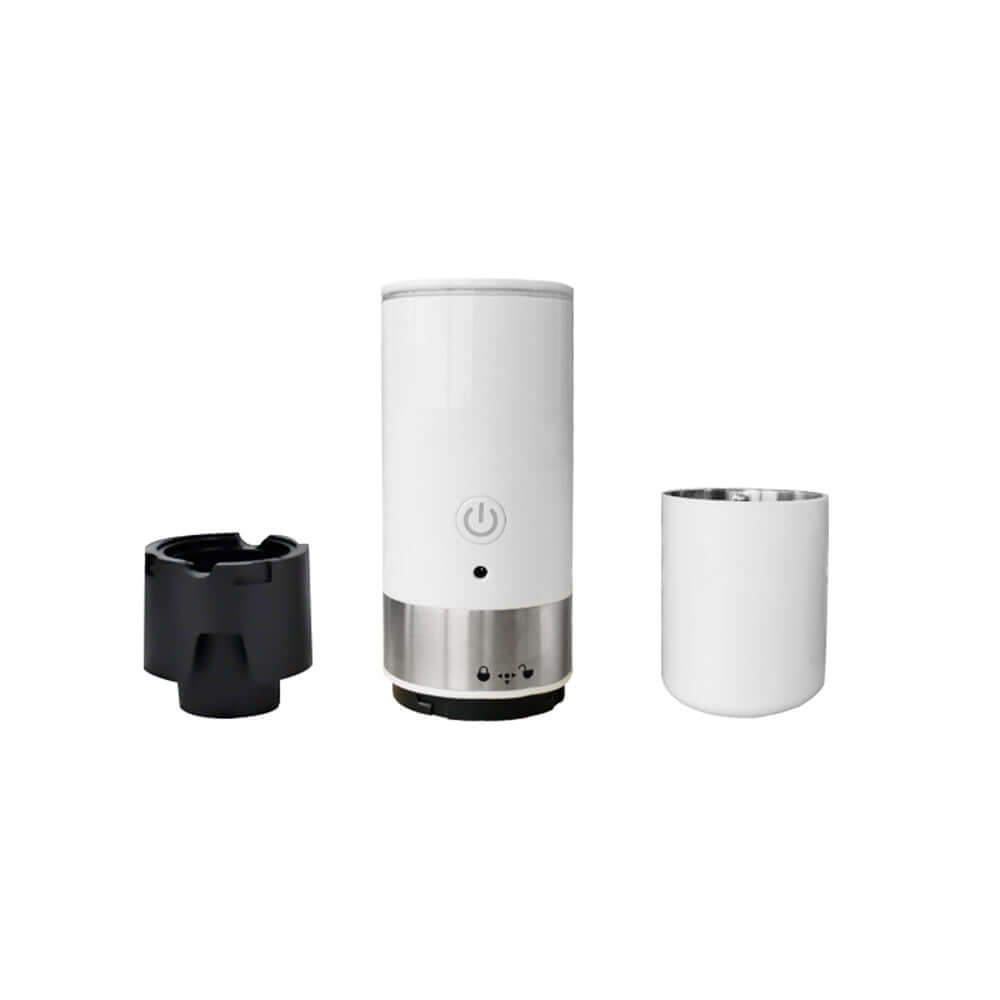 Portable coffee machine featuring a sleek white design, compatible with coffee capsules and grounds.