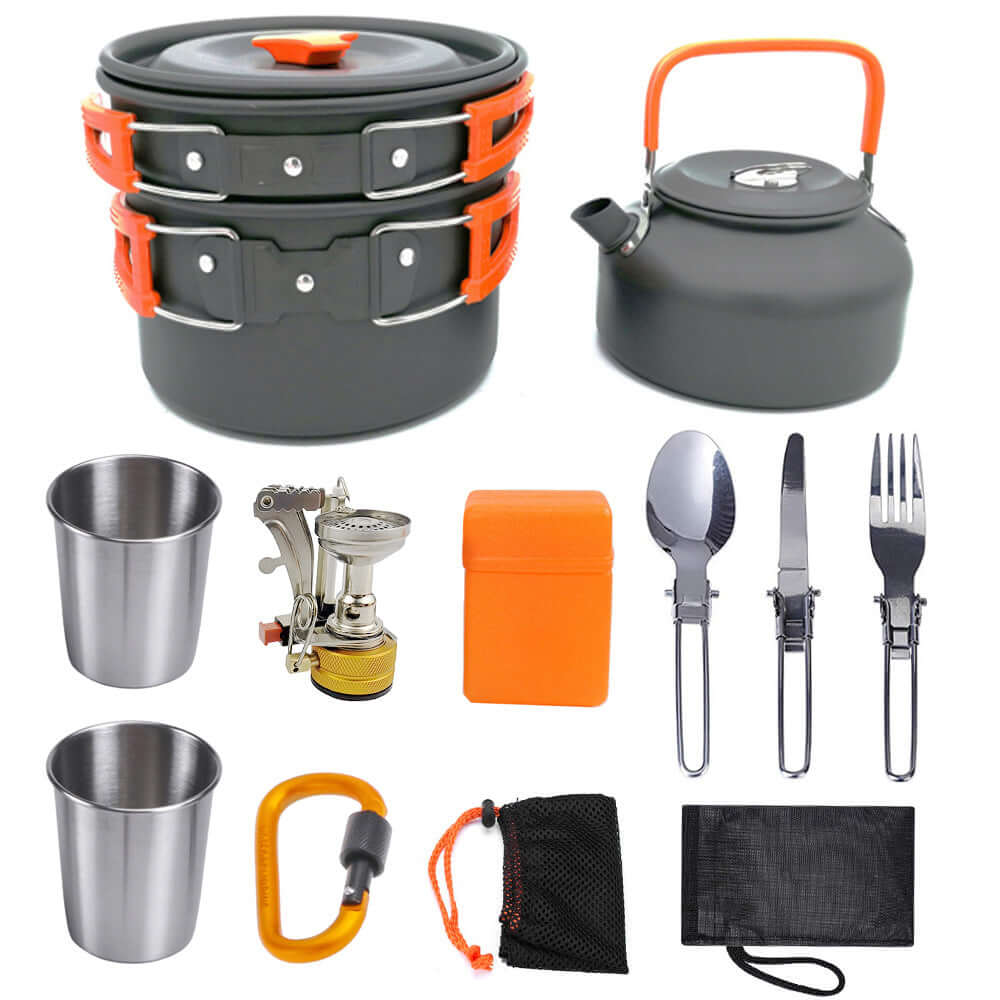 Portable camping cookware set with pots, kettle, utensils, and burner; perfect for outdoor cooking.