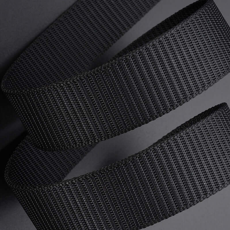 Men's black canvas belt made of durable material, featuring a sleek design and automatic buckle.