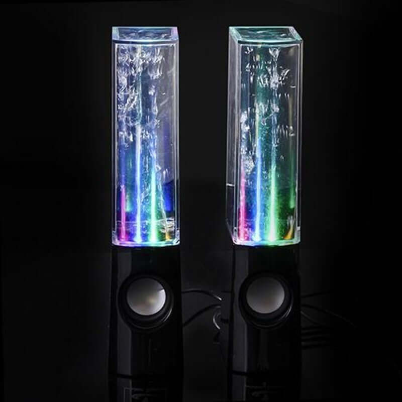 Wireless dancing water speakers with LED lights creating colorful fountains for home parties.
