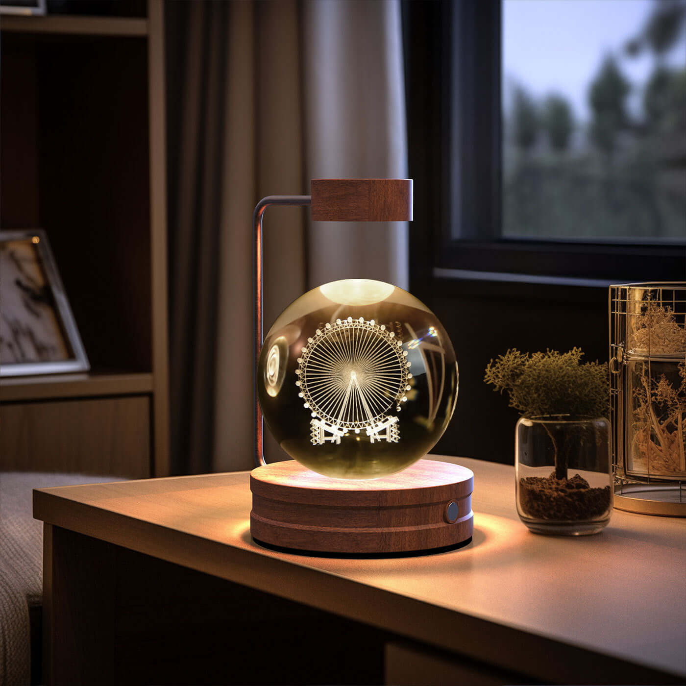 Crystal ball night light with 3D ferris wheel design, creating a warm ambiance on a bedside table.