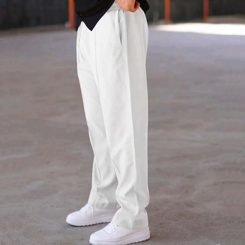 Men's white trousers with a loose straight fit and drawstring design, perfect for casual sportswear.