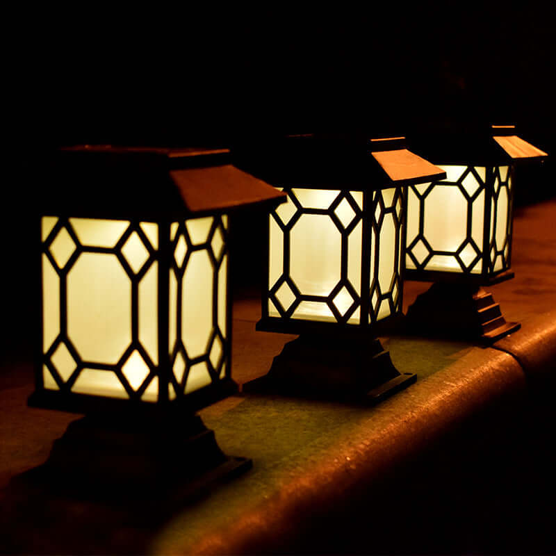 Elegant solar-powered lamps glowing softly in a courtyard garden, providing warm and vibrant lighting.
