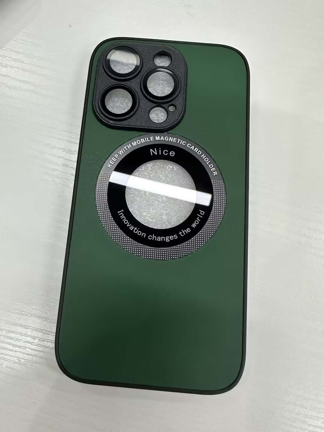 Green mobile phone case with magnetic card holder and embossed design, compatible with iPhone 15 Pro.