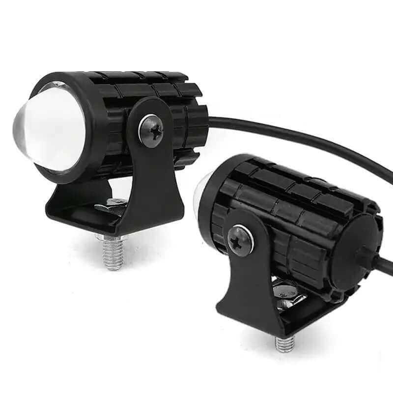 Two-color lens external motorcycle spotlights with aluminum housing and adjustable mounting.