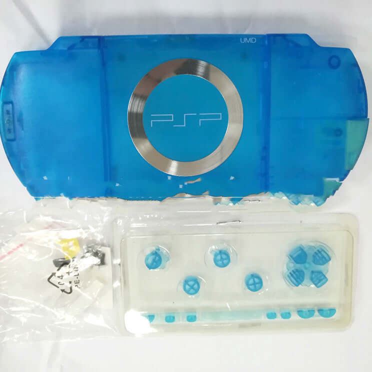 Transparent blue PSP1000 protective housing with buttons for portable gaming console protection.