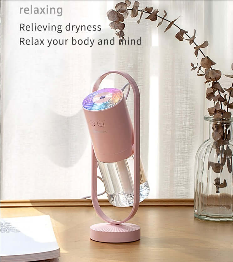 Magic Shadow USB Air Humidifier in a stylish pink design, enhancing relaxation and air quality with colorful night lights.