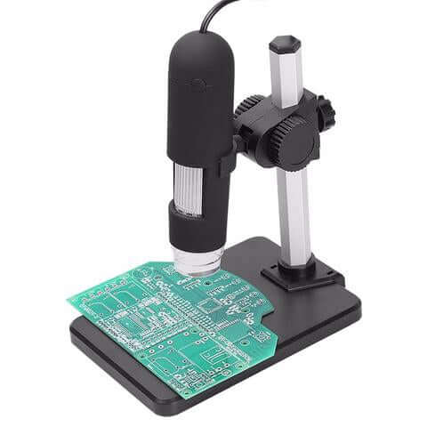 USB Microscope Camera with adjustable stand focusing on a green circuit board for detailed inspections.