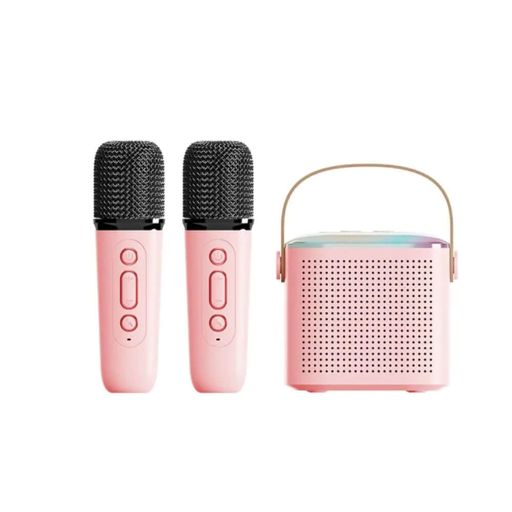 Pink dual wireless microphones with Bluetooth karaoke speaker, designed for home family singing and portable entertainment.