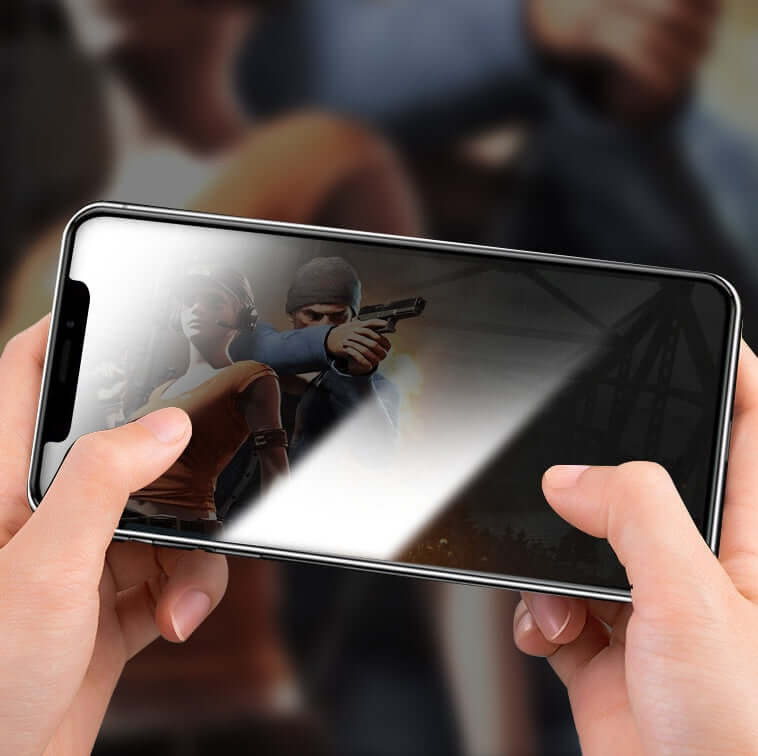 Hands holding a mobile phone displaying a gaming scene, emphasizing the screen's clarity and anti-peeping feature.