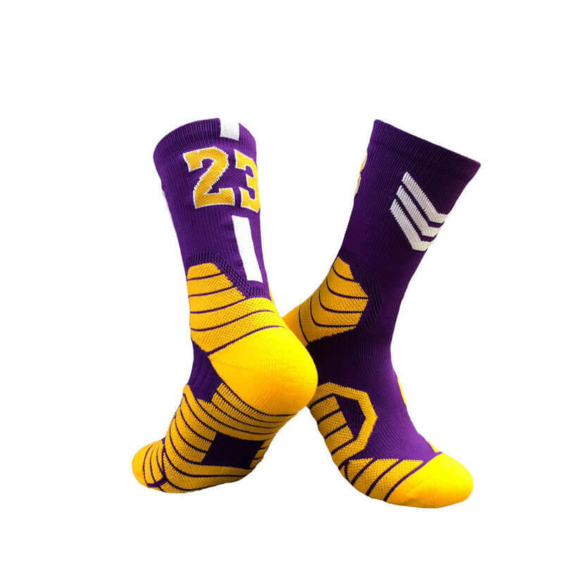 Purple and yellow superstar basketball socks with number 23, designed for comfort in sports activities.