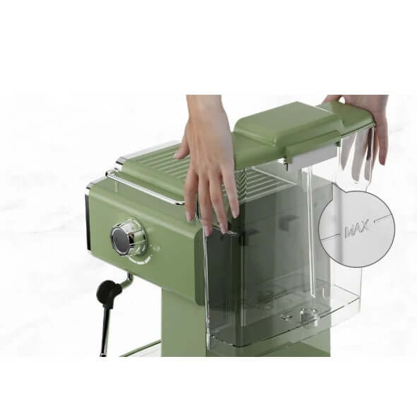 Person removing the transparent water tank from a green 15 bar espresso coffee machine.