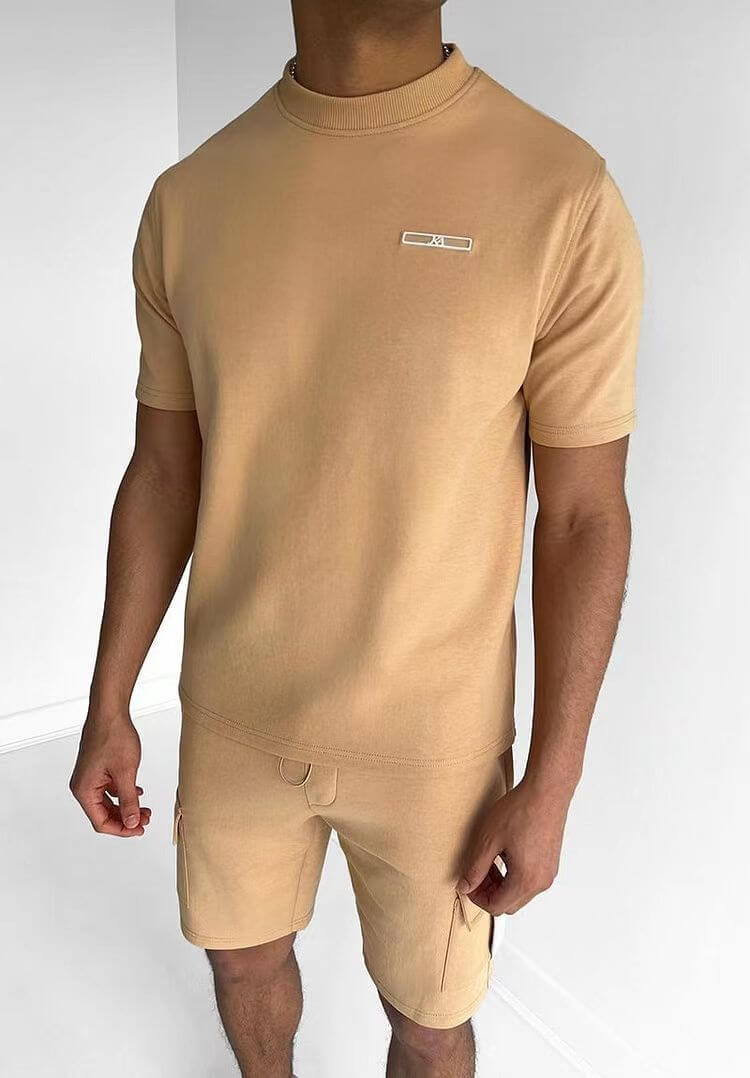 Men's casual sports t-shirt and shorts set in beige, designed for comfort and style in sports activities.