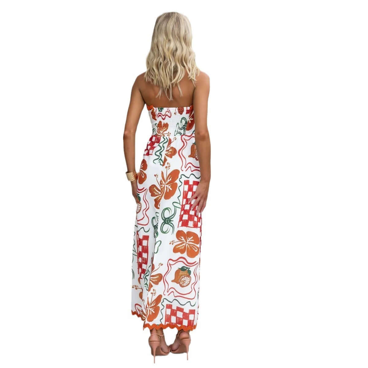Back view of a women's chest-wrapped pleated casual dress featuring colorful plant prints and a long A-line skirt.