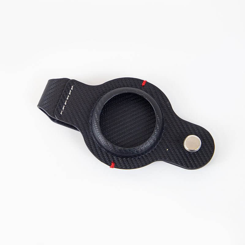 Black leather AirTag holder with key ring, stylish and durable design for keychain accessories.