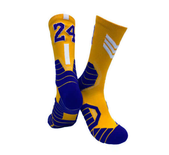 Yellow and blue Superstar basketball socks featuring the number 24, designed for professional sports performance.
