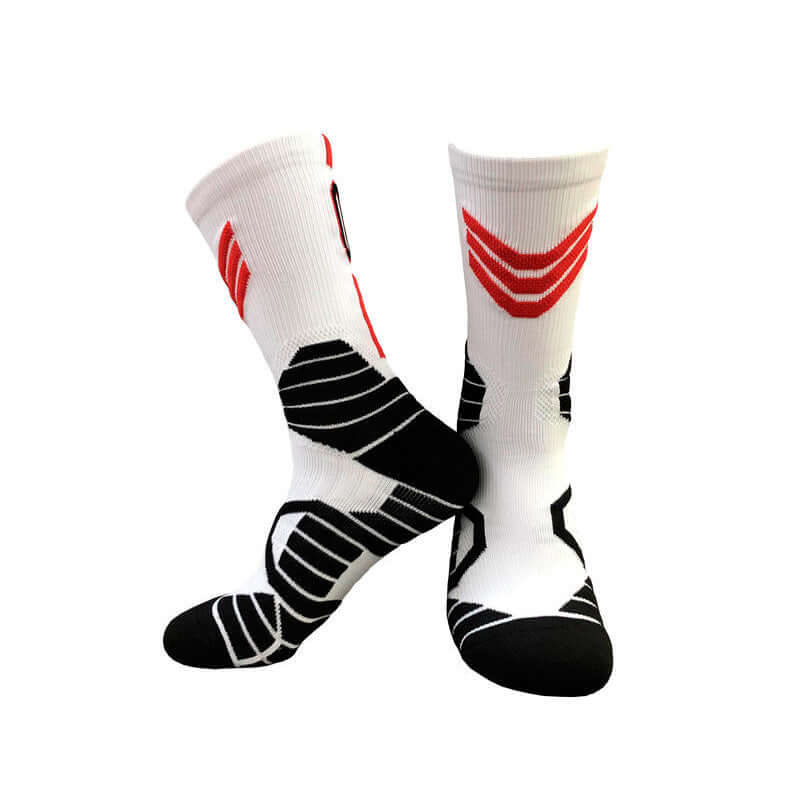 Superstar basketball socks in black and white with red accents, made for professional sports with comfort and durability.