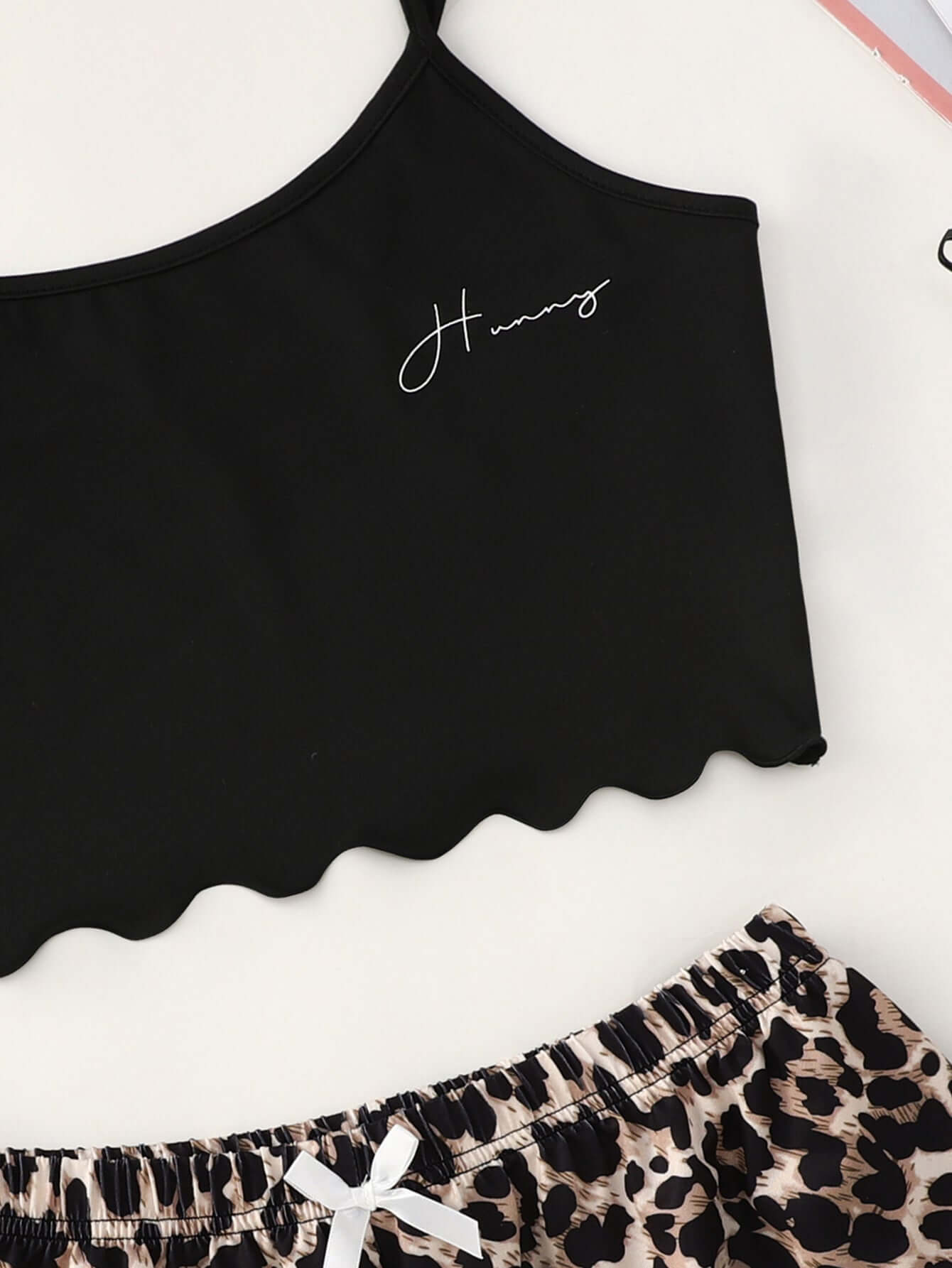 Leopard print shorts and black crop top home wear set, featuring a scalloped hem and stylish design for leisure wear.