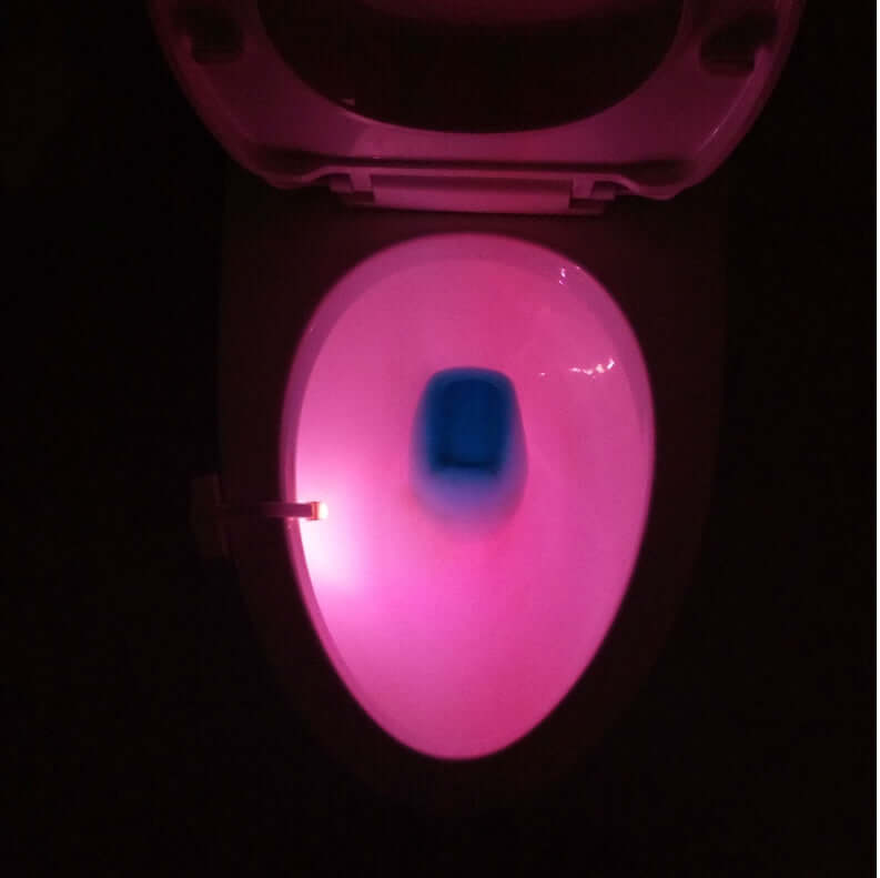 Toilet Induction LED Night Light showcasing a colorful glow in the toilet bowl with a hygienic, motion-sensor design.