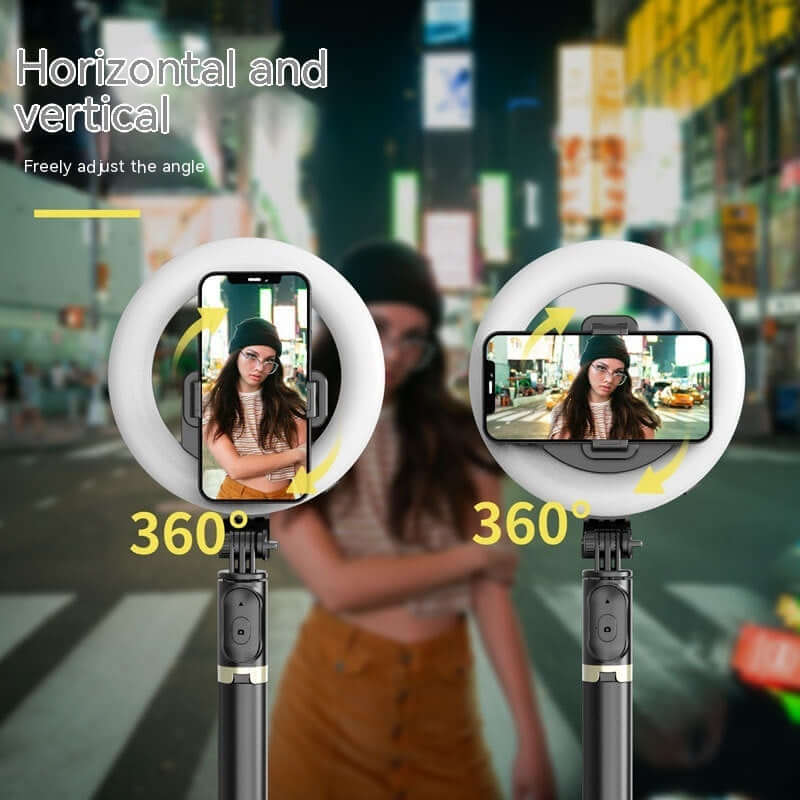 Bluetooth Self Ring LED Fill Light Tripod with adjustable 360-degree angle for horizontal and vertical use in a city setting.