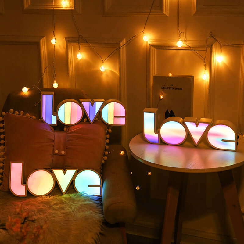 Colorful LED love lights on display, perfect for festive holiday decoration and cozy home ambiance.