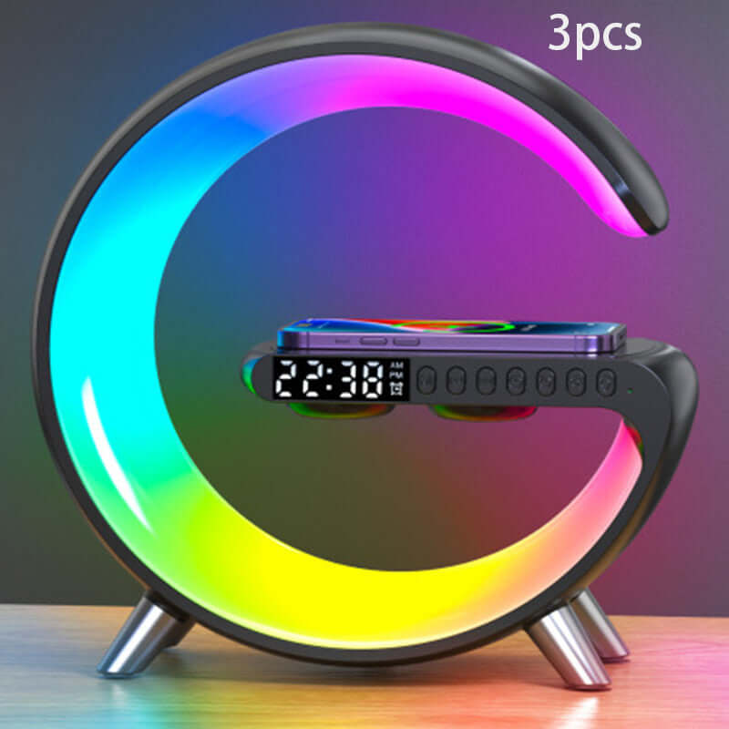 G shaped LED lamp with wireless charger, Bluetooth speaker, and colorful ambient light for home decor.