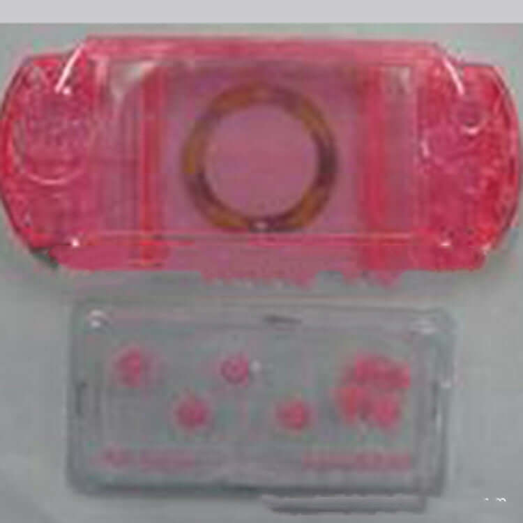 Transparent pink protective housing for PSP1000 handheld console, featuring full cover design.