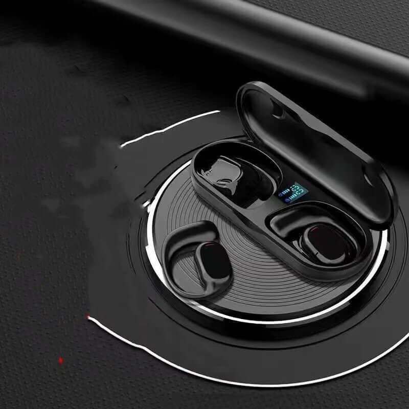 Wireless earbuds in charging case with digital display on a textured surface, showcasing portability and modern design.