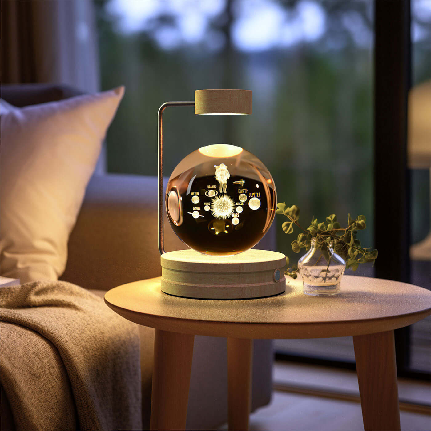 Crystal ball cosmic dinosaur night light on a wooden table, creating a warm and romantic home atmosphere.