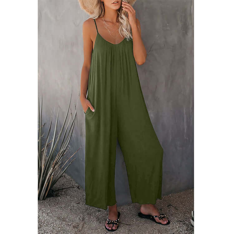 Women's loose sleeveless jumpsuit in army green, stylish and comfortable for summer, featuring pockets and long pants.