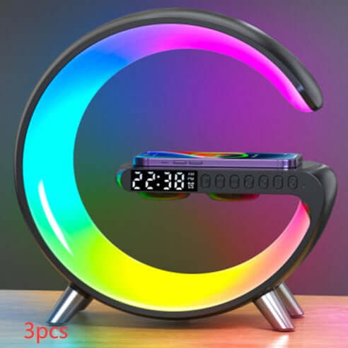 G shaped LED lamp with Bluetooth speaker, wireless charger, and colorful light effects for modern home decor.
