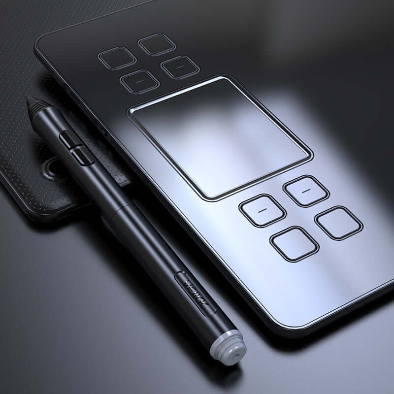 Digital drawing tablet with black stylus and touch-sensitive controls shown on a sleek surface.