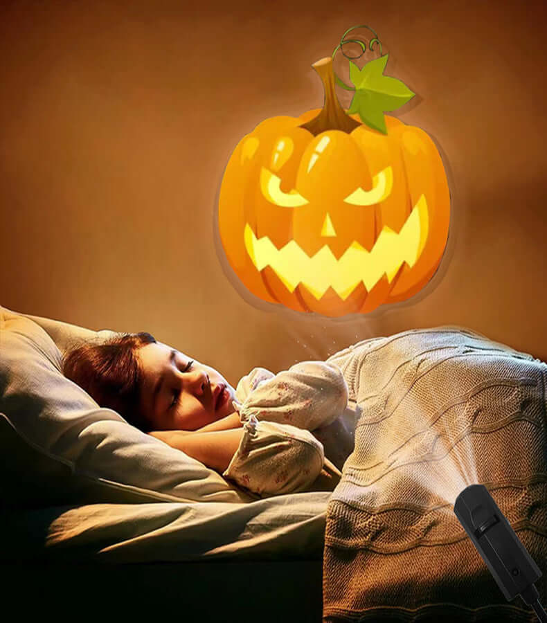 Child peacefully sleeping with a glowing pumpkin projection above, illuminated by a night lamp.