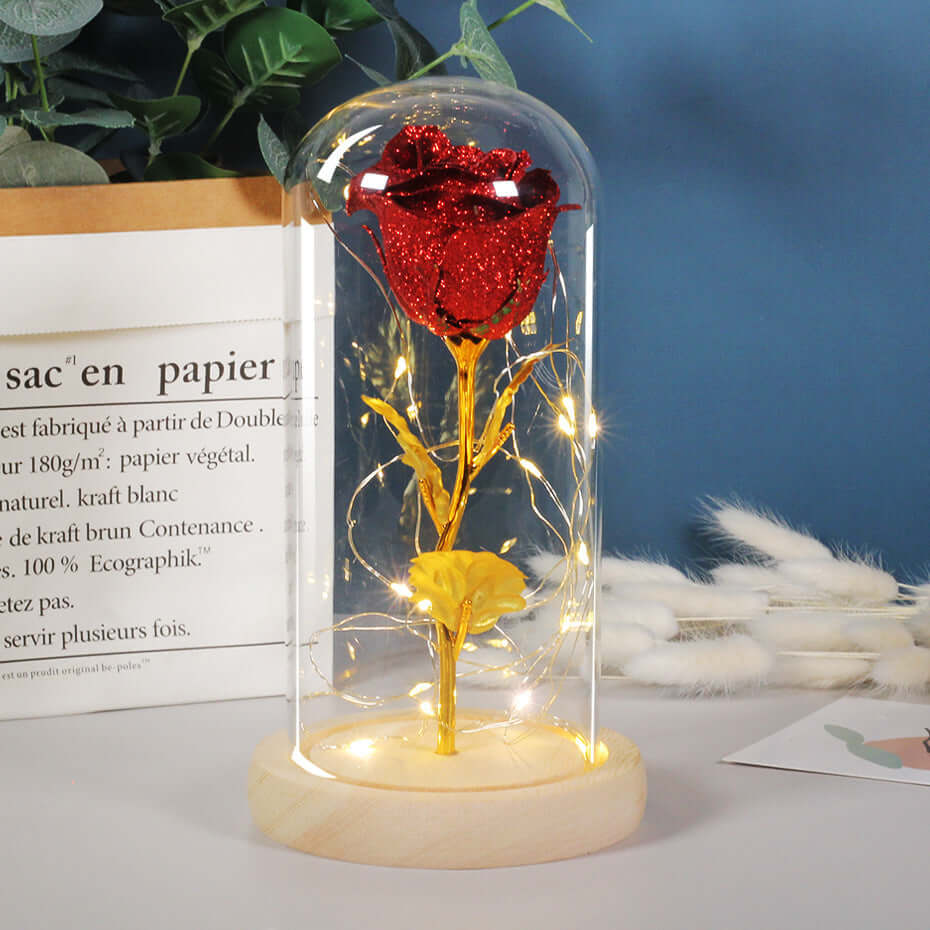 Eternal rose in glass dome with LED lights, perfect for Valentine's Day gifts and romantic decor.