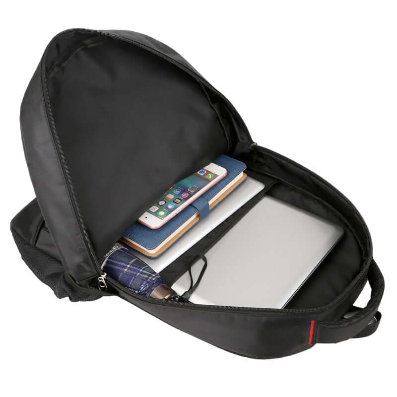 Interior view of a laptop backpack featuring compartments for devices, including a laptop and phone, in sleek black Oxford cloth.