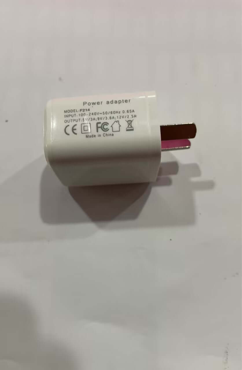 Power adapter with specifications, designed for fast charging and compatibility with various devices.