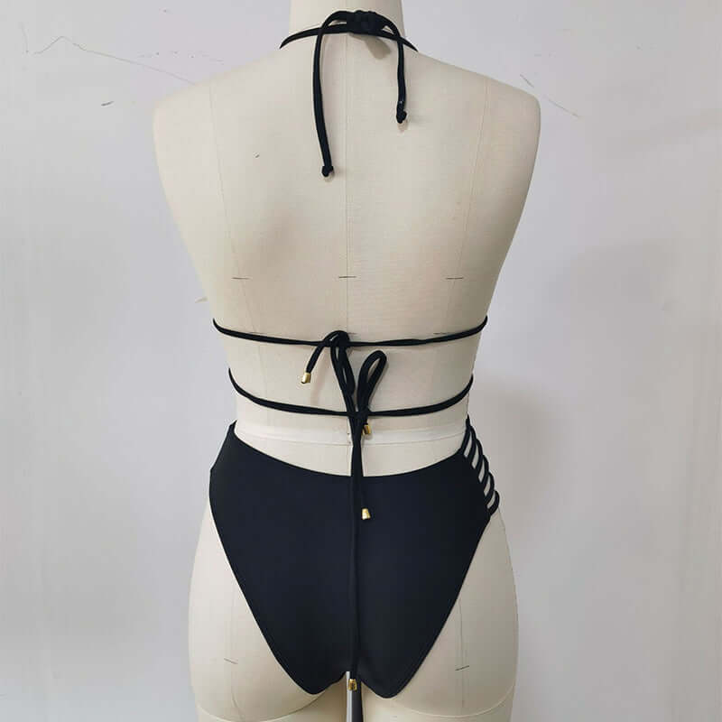 Back view of a black two-piece halter neck bikini with cutout strap design, perfect for summer beach wear.